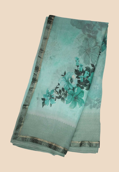 Aquatic Blossoms - Turquoise Blue Georgette Saree with Vivid Floral Print